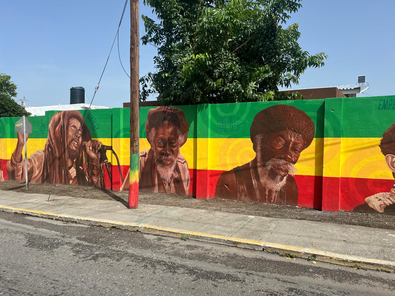 Mural of Bob Marley and The Wailers in Trench Town, Kingston, Jamaica, highlighting the vibrant culture and music scene in our Kingston, Jamaica Travel Guide