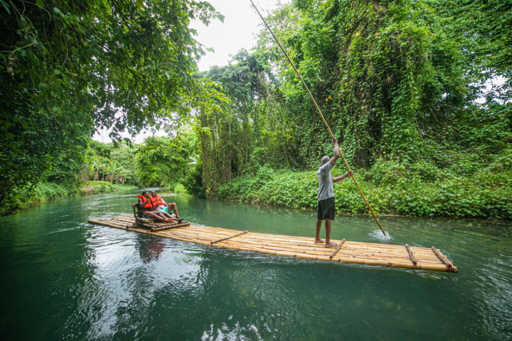 Overview of Montego Bay, Jamaica with a couple rafting on the Martha Brae River