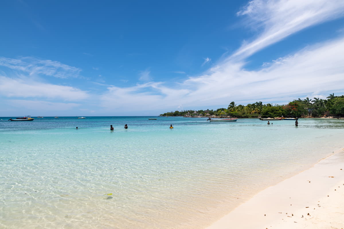 Scenic view of Puerto Seco Beach showcasing clear skies and calm waters.
